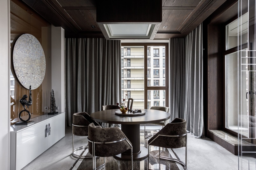 Minimal dining and kitchen interior with carefully coordinated textures